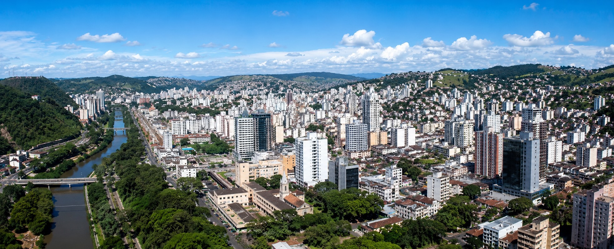 Vista aérea de JF. Imagem gerada por IA Vista área de Juiz de Fora. Foto IA